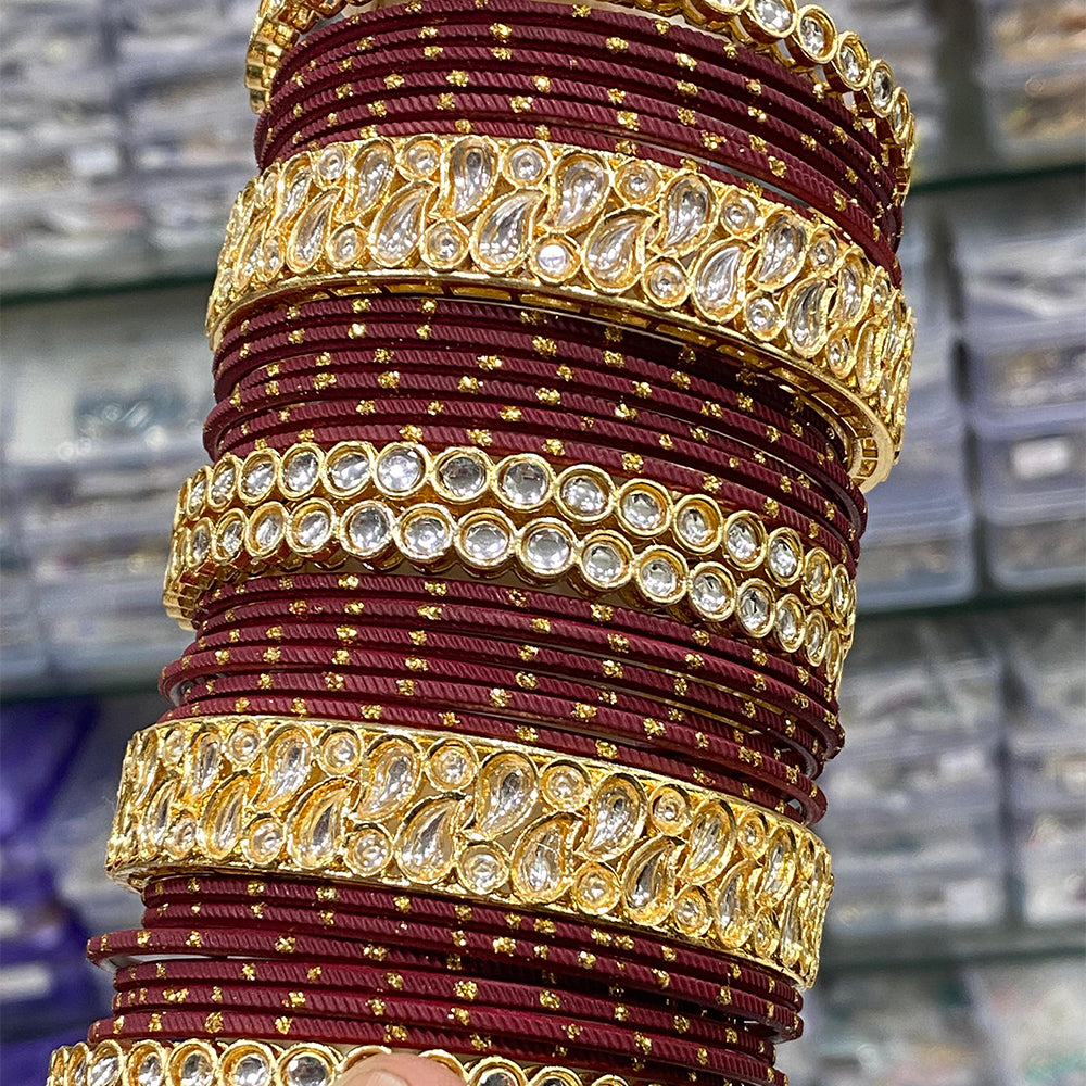 Hira Collection Teeyani Kundan Stone Bangles Set